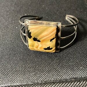 Vintage silver tone cuff bracelet with square stone inset